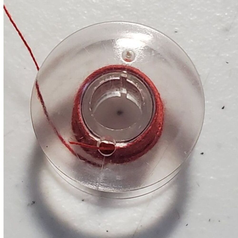 Platic Small Spool Bobbins 7 in set pre-loaded